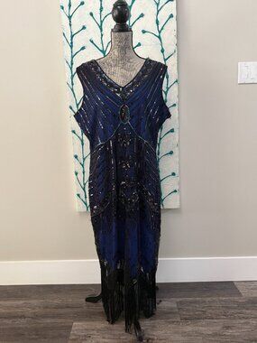 Women's plus size beaded flapper style dress. Never been worn.